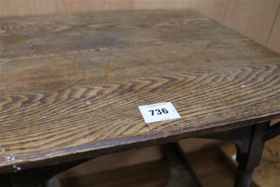 An Arts & Crafts oak table 61cm